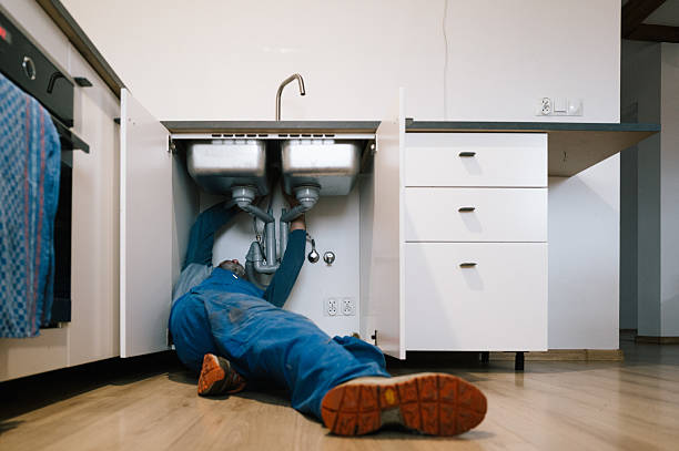 Professional Drain Cleaning technician working in Woodstock, IL
